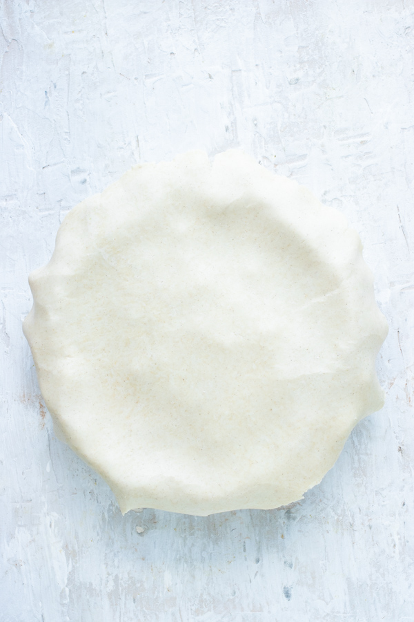 The second pie crust is used to cover the pot pie.