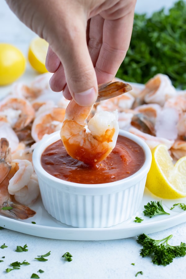 Cocktail sauce is used to enjoy fresh cooked shrimp.