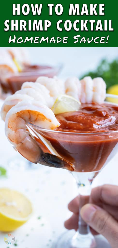 Two cups of shrimp cocktail are served for a holiday party appetizer.