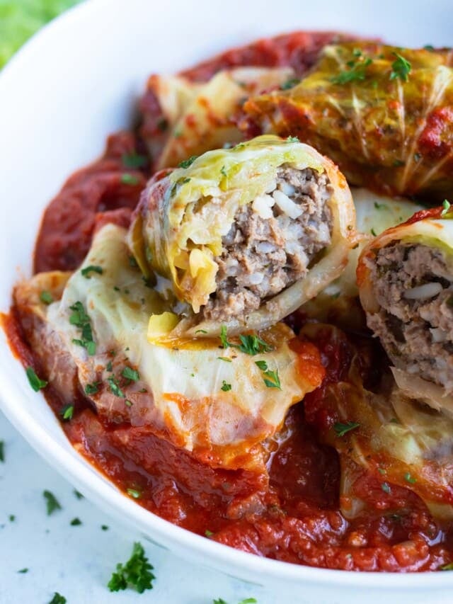 Boiled cabbage is stuffed with ground beef and rice in this classic Polish recipe.