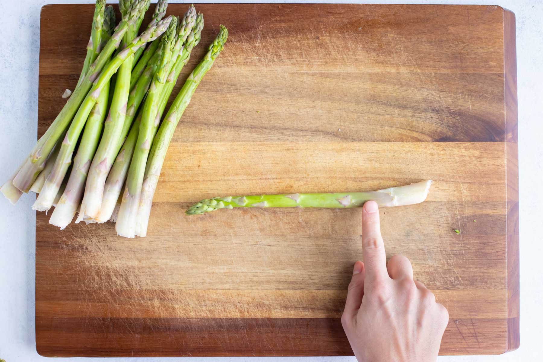 The end of the asparagus is removed.