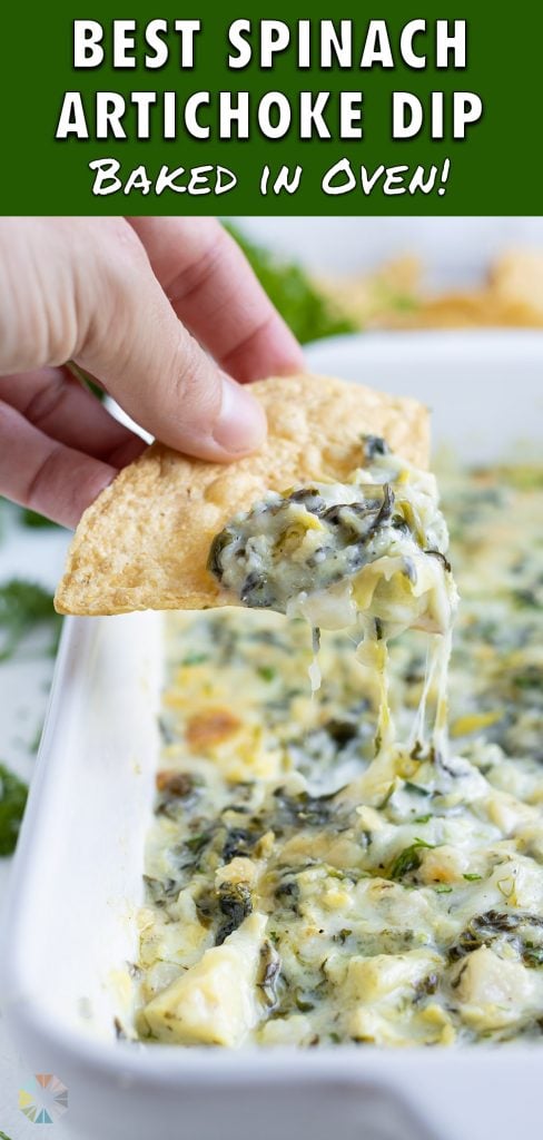 A chip is used to eat this spinach artichoke dip.
