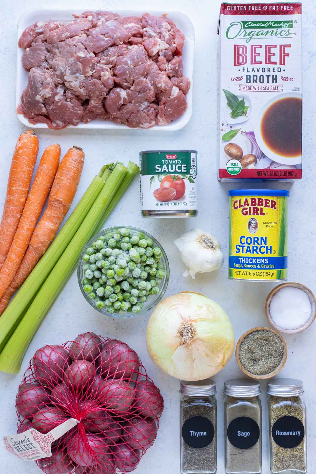 Carrots, celery, potatoes, onion, peas, beef, cornstarch, beef broth, and canned tomatoes are the ingredients for this recipe.