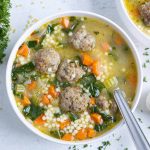 Bowl of Italian wedding soup is served for lunch.