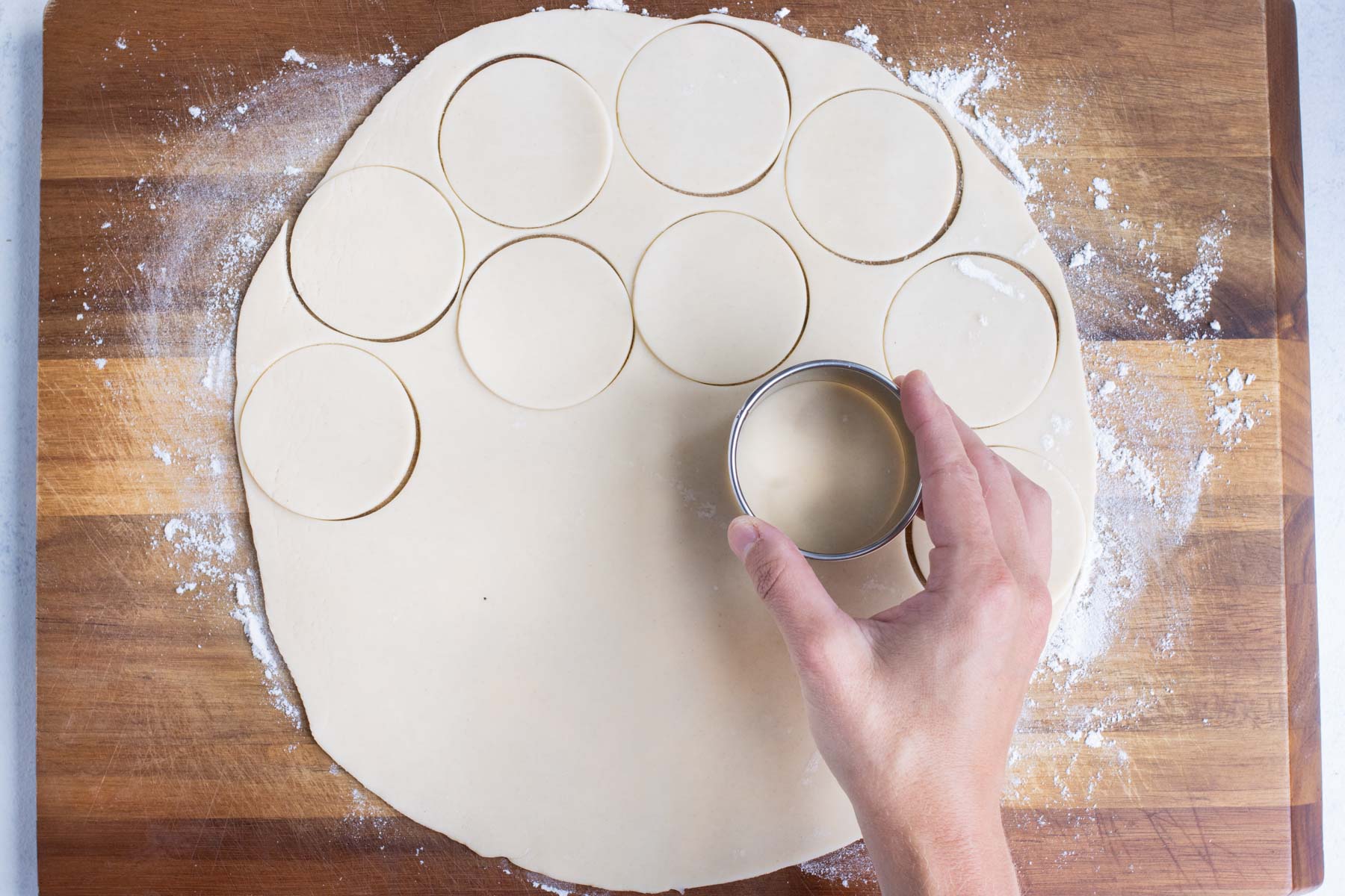 48 mini circles are cut out of the pie crust.