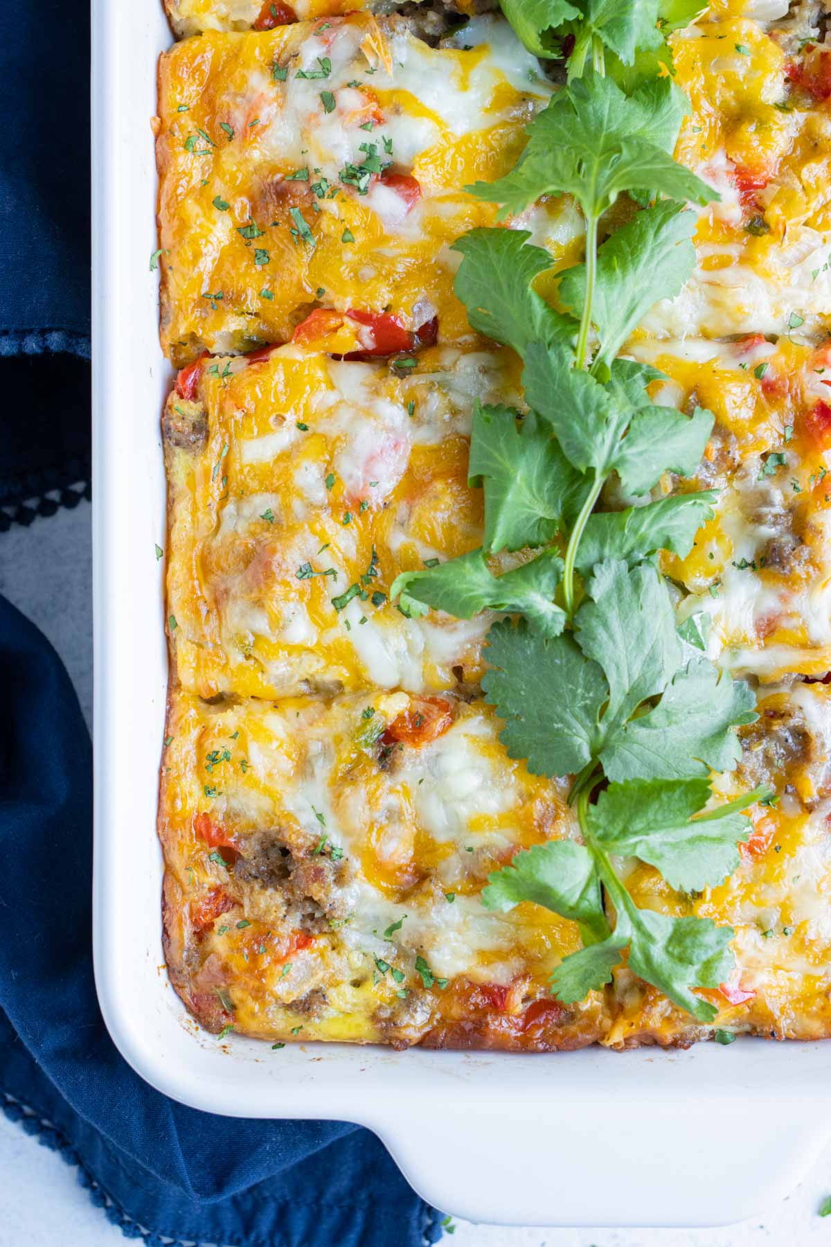 Breakfast casserole is shown from an overhead shot.