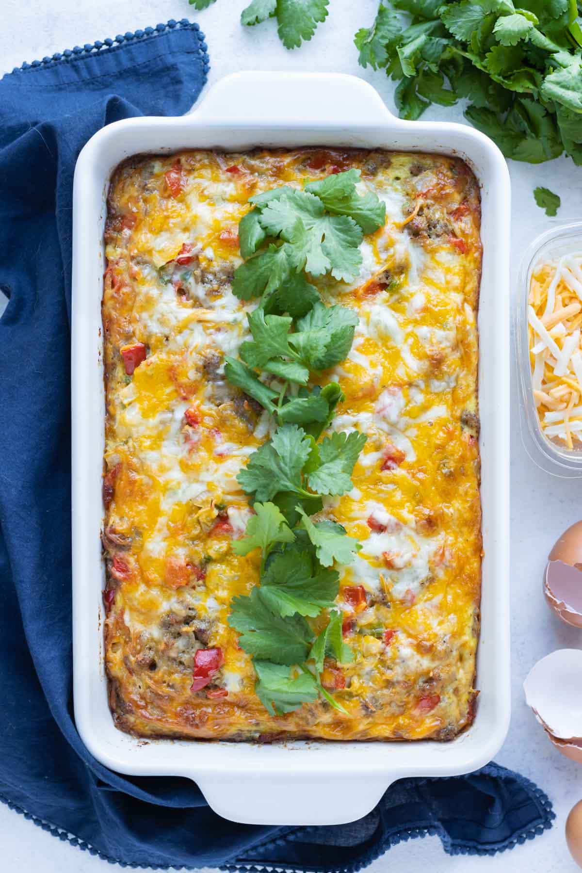 An overhead shot is used to show breakfast casserole on the counter.