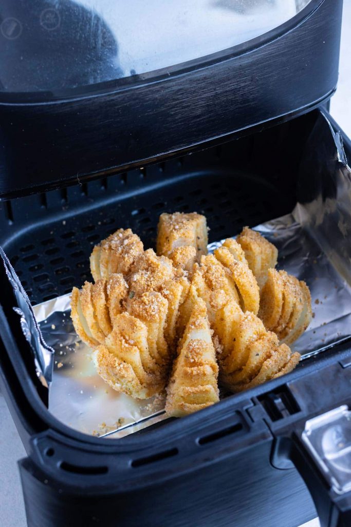 Easy blooming onion is made in the air fryer until golden brown.