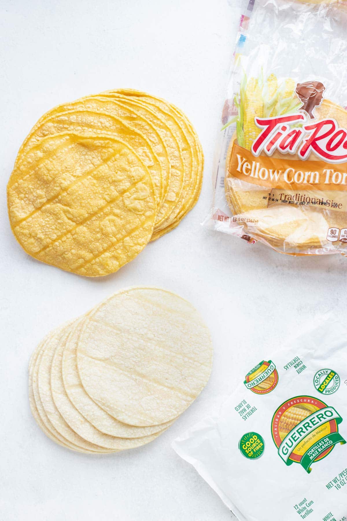 White corn tortillas and yellow corn tortillas.