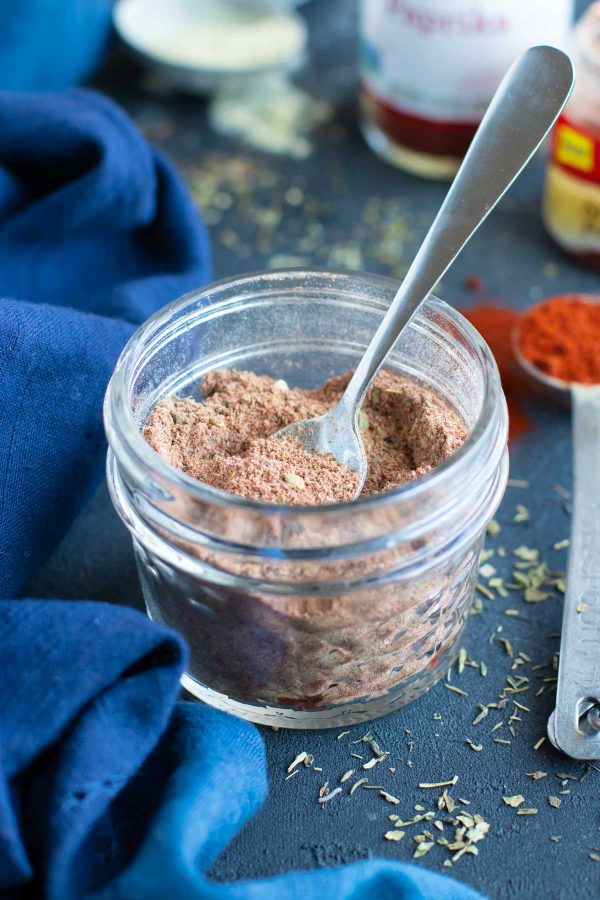 A mason jar full of the best blackened seasoning recipe that is gluten-free, healthy, and low-carb.