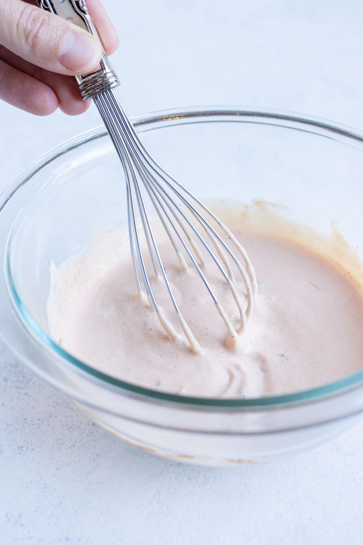 Whisk is used to combine all the ingredients until smooth.