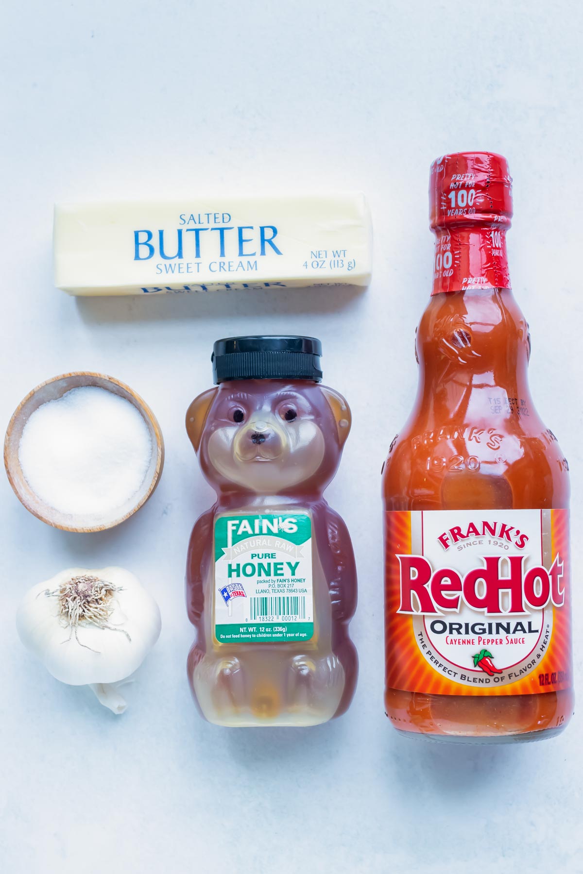 Butter, Hot sauce, honey, garlic, and salt are the ingredients used for this homemade buffalo sauce.