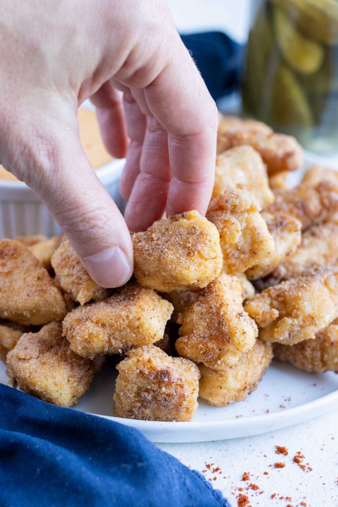 A plate of chicken nuggets are a finger food.