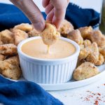 Chicken nuggets are served with a secret dipping sauce.