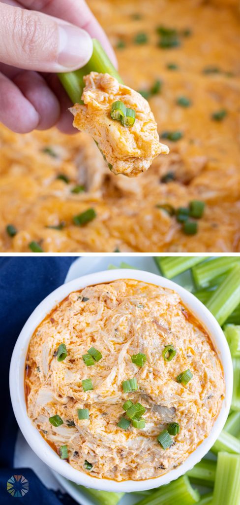 Buffalo chicken dip is scooped out of the bowl by celery.