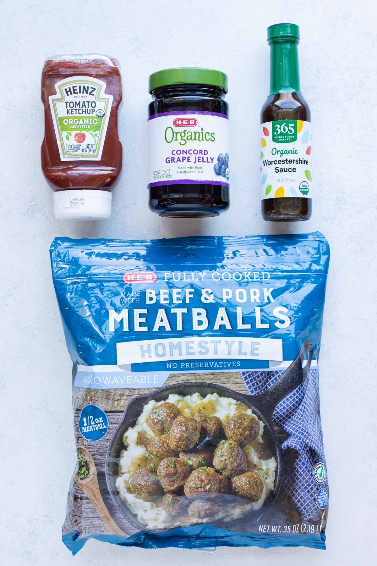 Meatballs, grape jelly, ketchup, and Worcestershire sauce are the ingredients for this recipe.