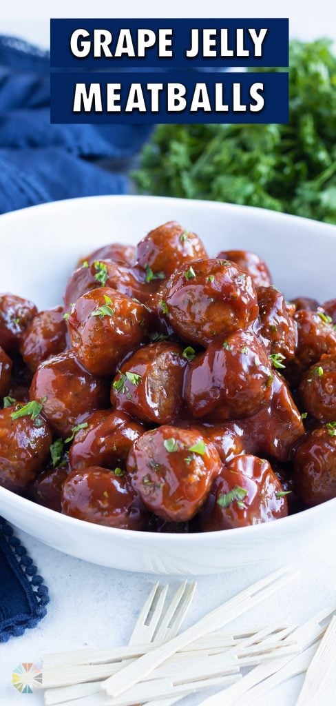 Meatballs are served in a white bowl for an appetizer.