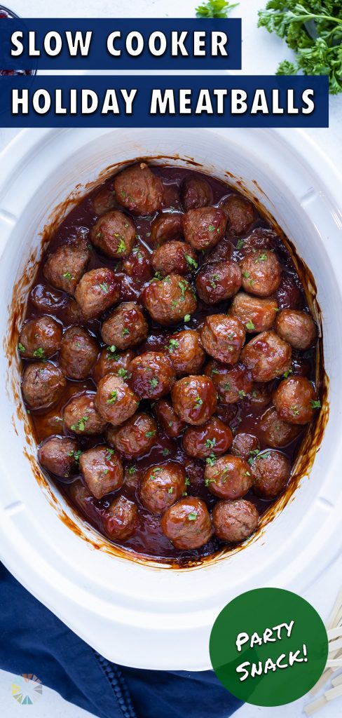 Meatballs are covered in delicious sauce and parsley.