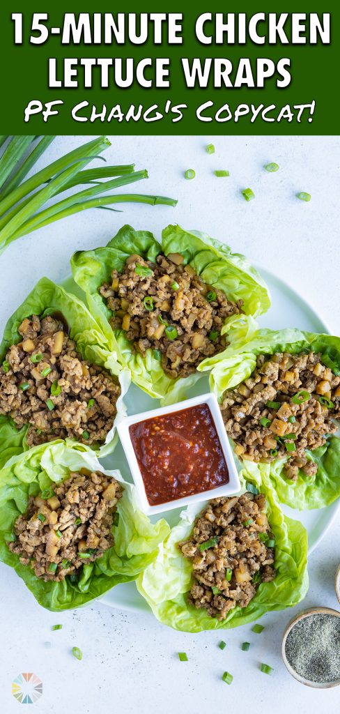 Chicken lettuce wraps are served with a dipping sauce.