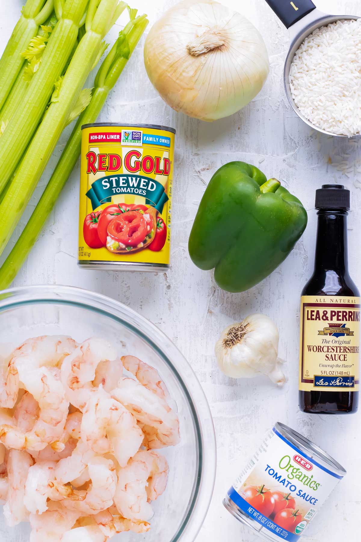 Shrimp, canned stewed tomatoes, Worcestershire sauce, onion, green bell pepper, garlic, and tomato sauce as the ingredients in an easy shrimp creole recipe.