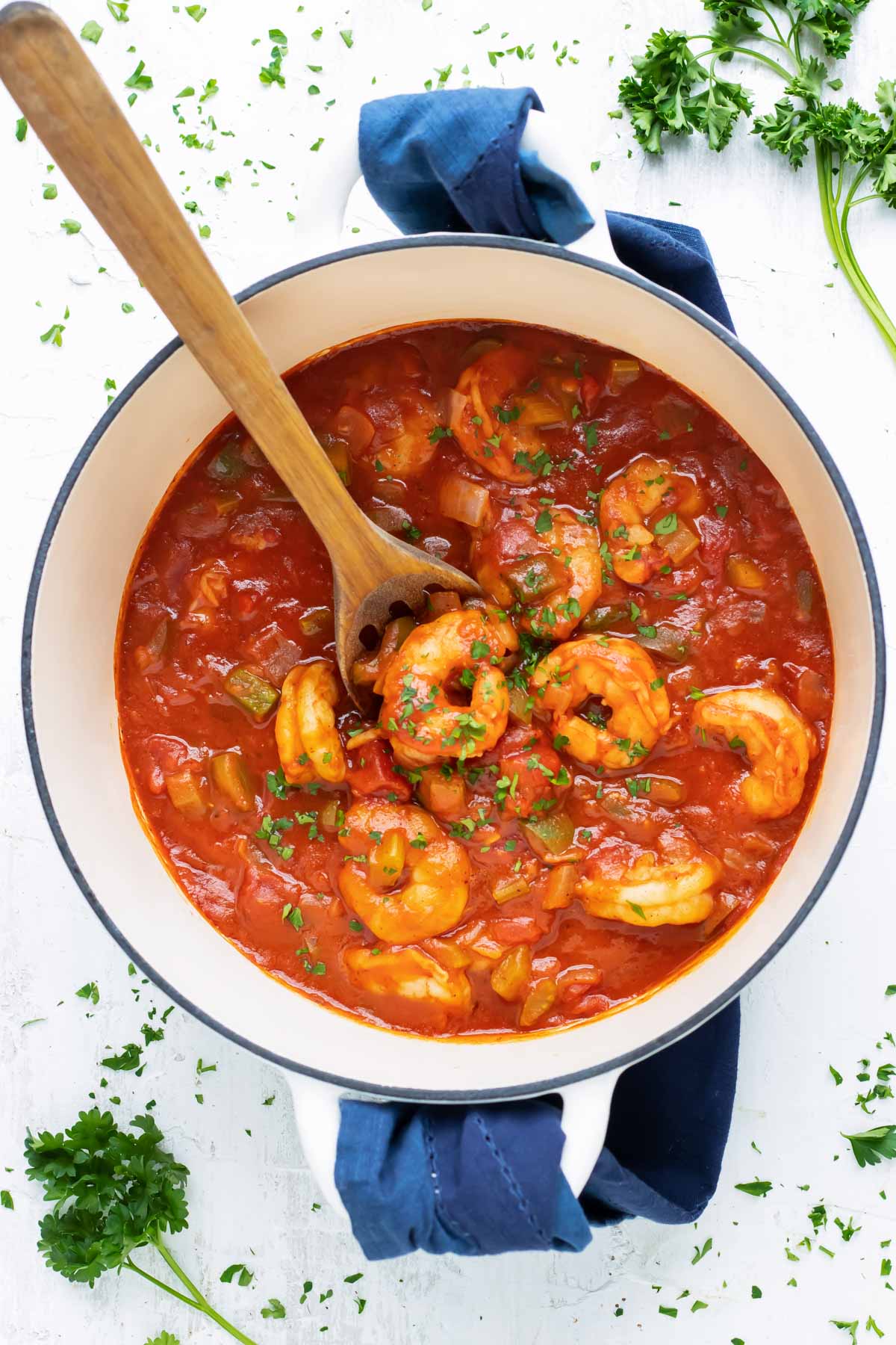 A Dutch oven full of an easy Mardi Gras and Cajun recipe for Shrimp Creole.