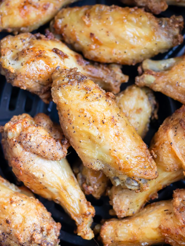 Chicken wings are made in an air fryer for an easy low-carb snack.