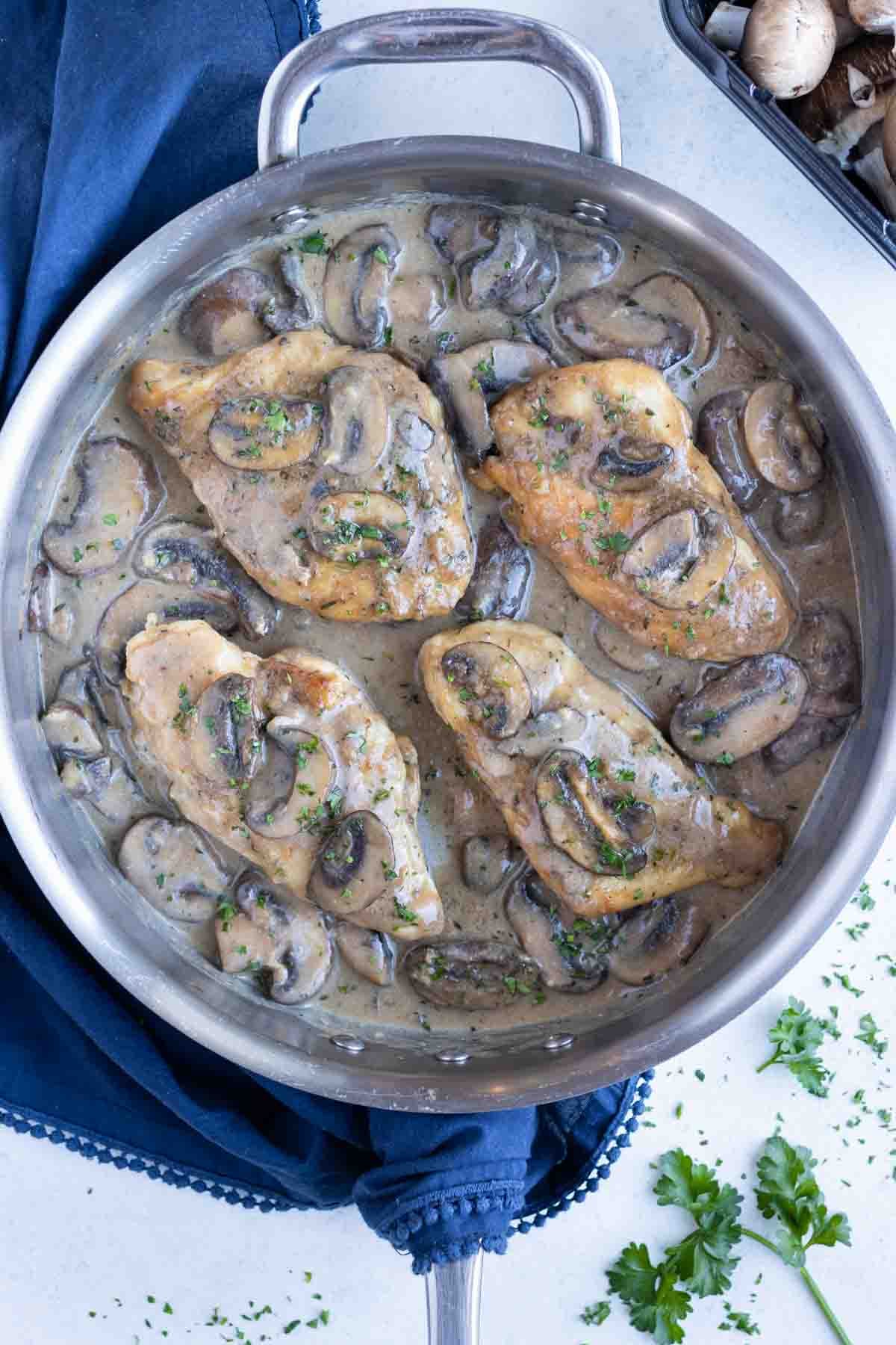 Olive Garden Chicken Marsala RECIPE served in a skillet.