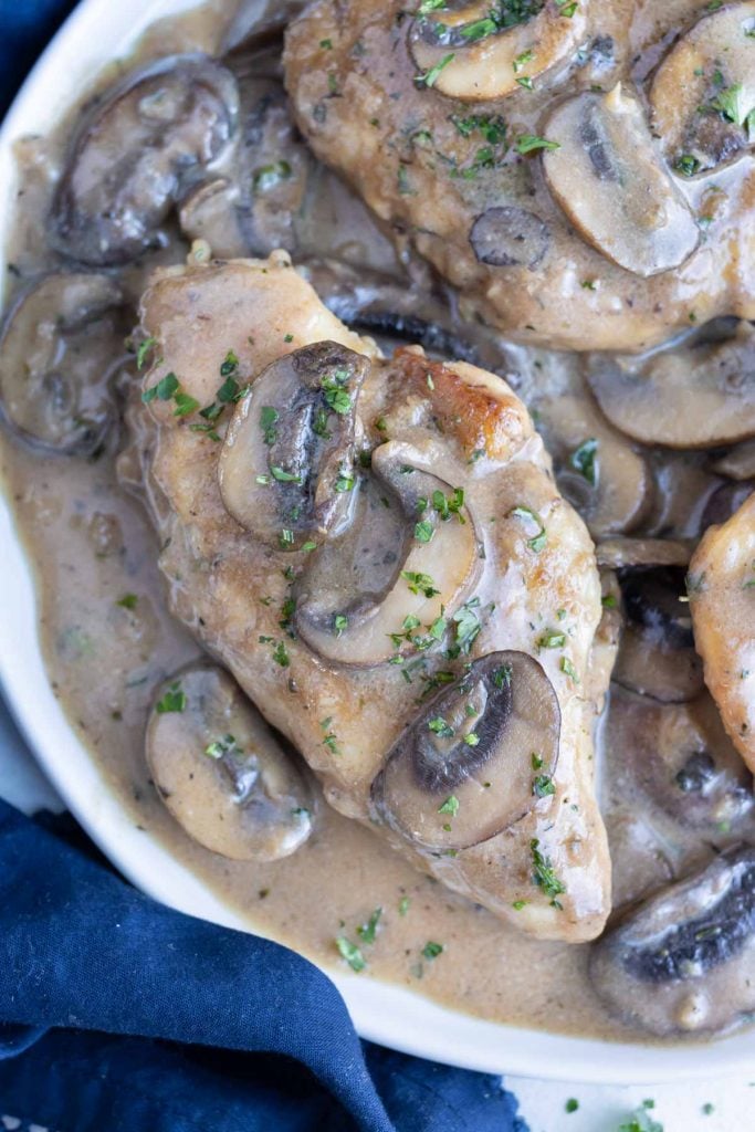 Creamy Marsala sauce is served with the Chicken Marsala.
