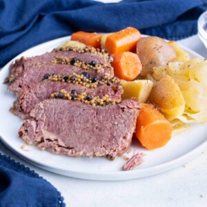 Instant pot corned beef and cabbage is shown for a St. Patrick's meal.