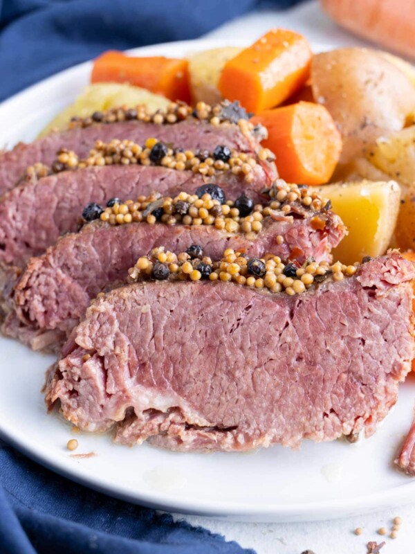 Irish corned beef and cabbage is served on a plate for dinner.