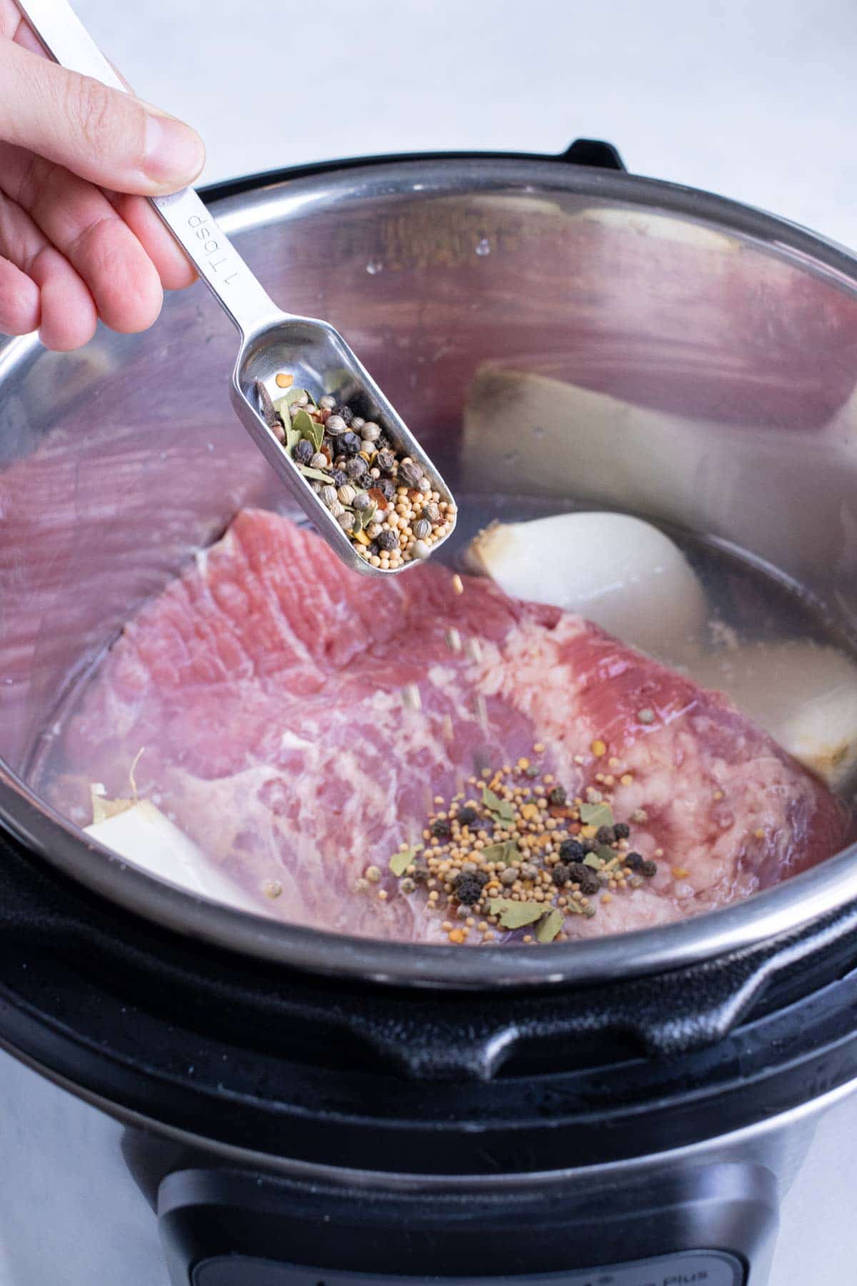 Pickling spice is added to the corned beef brisket.