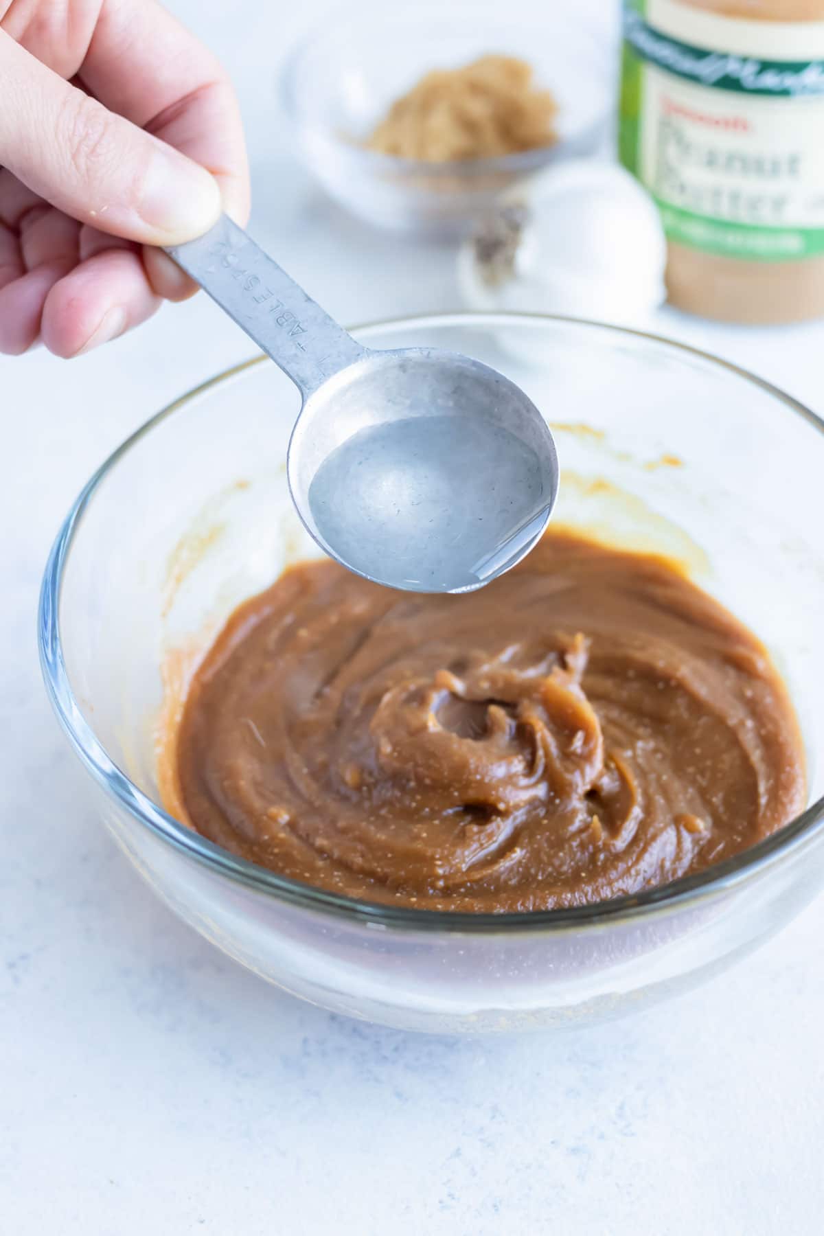 Water is added to the ingredients for a thinner dipping sauce.