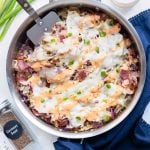 Low-carb reuben in a bowl is served from a skillet with a spatula.Low-carb reuben in a bowl is served from a skillet with a spatula.