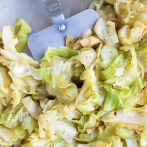 Vegan friendly cabbage recipe is cooked in a skillet.