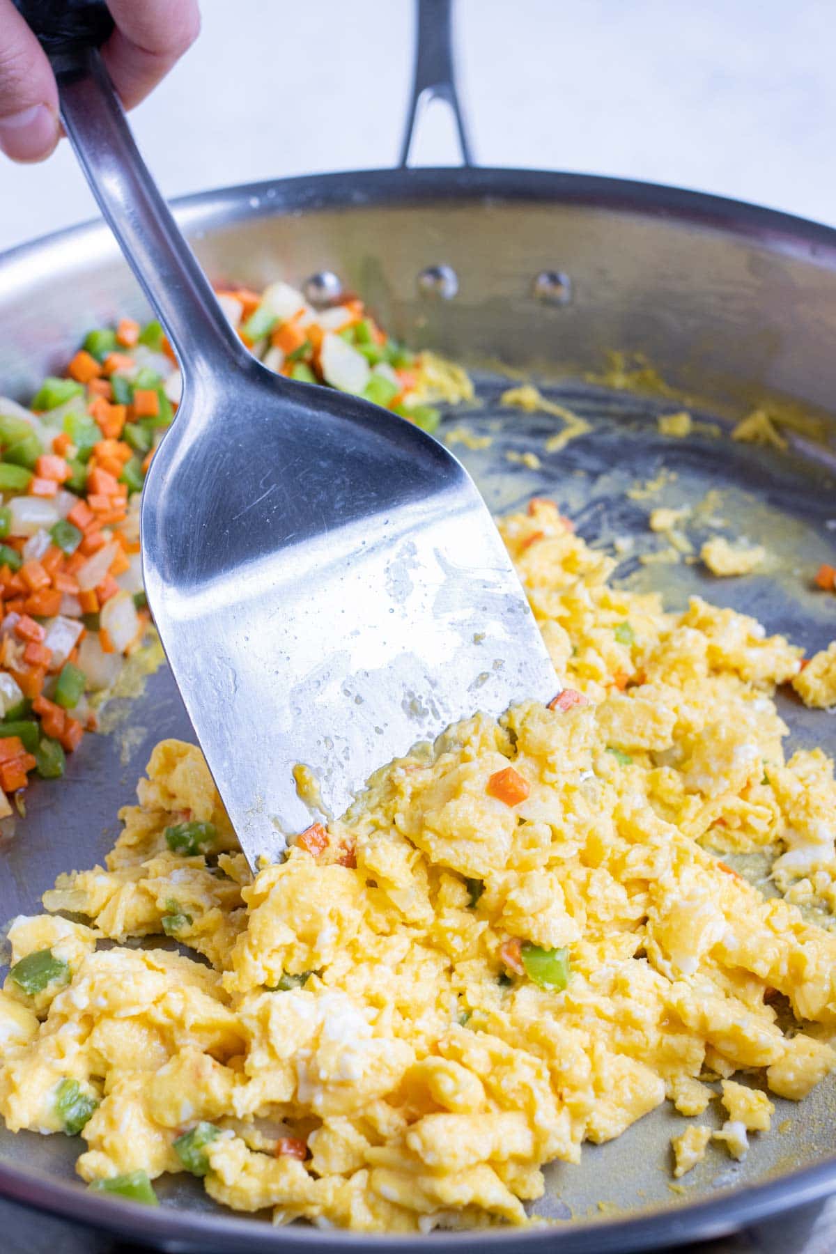 Eggs are added to the pan for cooking.