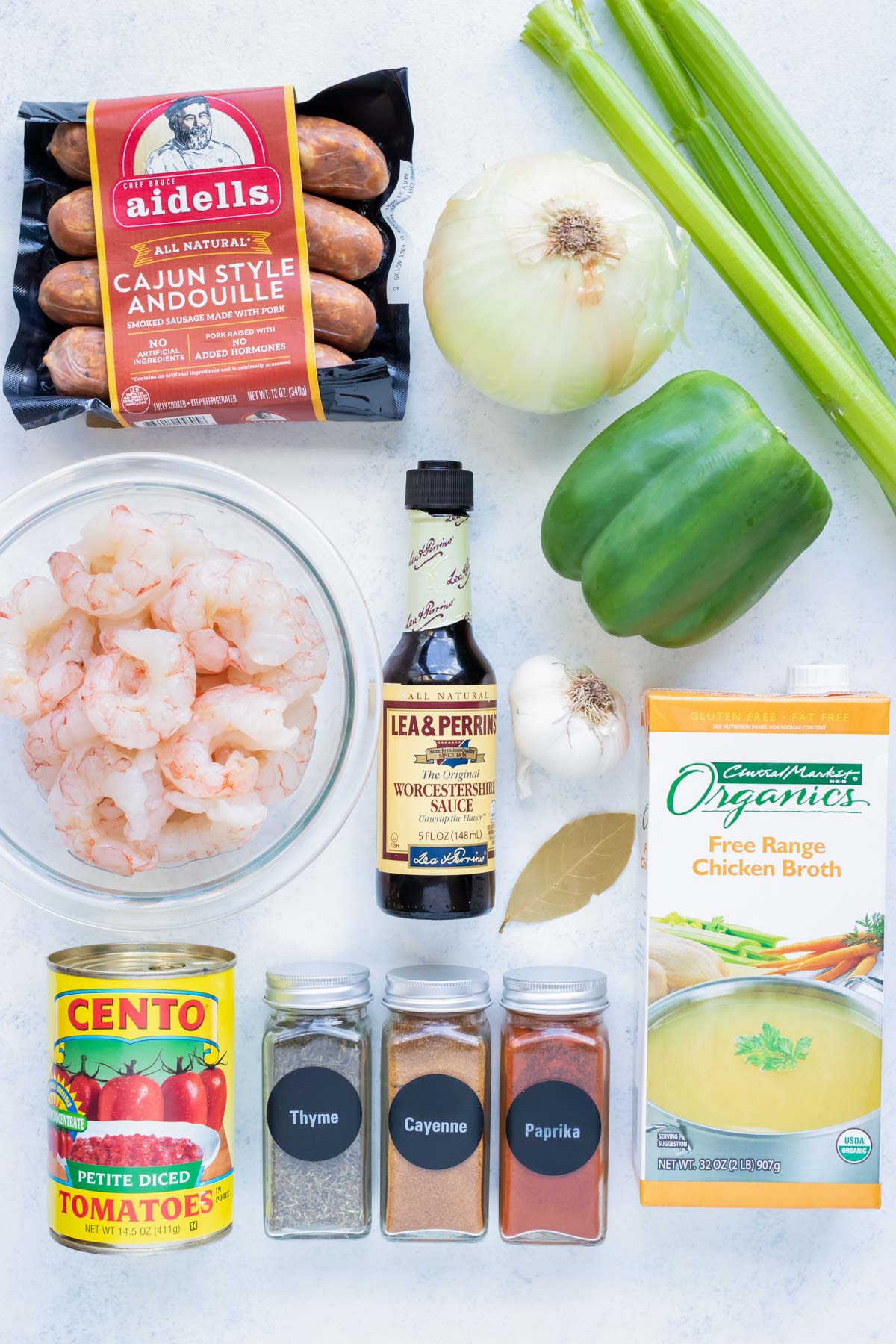 Shrimp, sausage, tomatoes, cajun spices, celery, onion, peppers, roux, and Worcestershire Sauce are the ingredients needed.