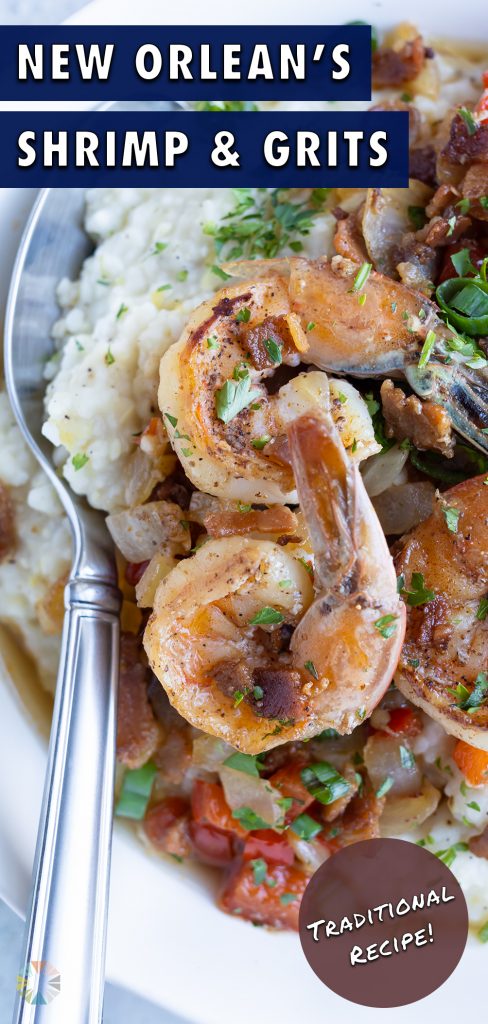 A spoon is used to eat traditional southern shrimp and grits.