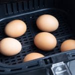 An air fryer is used to make hard-boiled eggs.