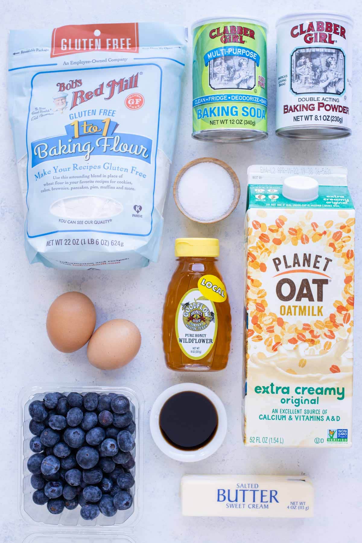 Flour, milk, eggs, honey, blueberries, vanilla, baking powder, and baking soda are the ingredients for this recipe.