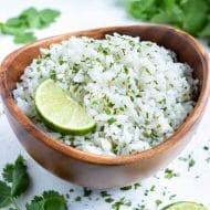 Easy cilantro lime rice is served for a healthy Mexican dish.