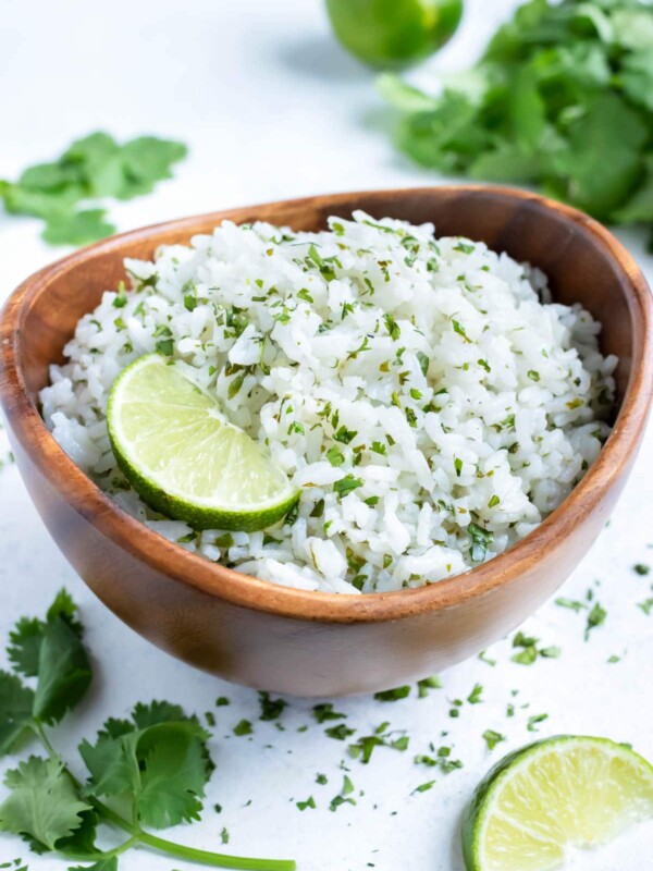 Easy cilantro lime rice is served for a healthy Mexican dish.