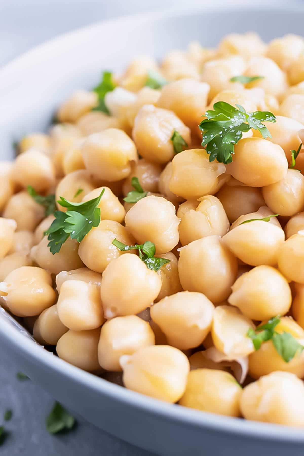 A close-up image of cooked chickpeas that were prepared on the stovetop.