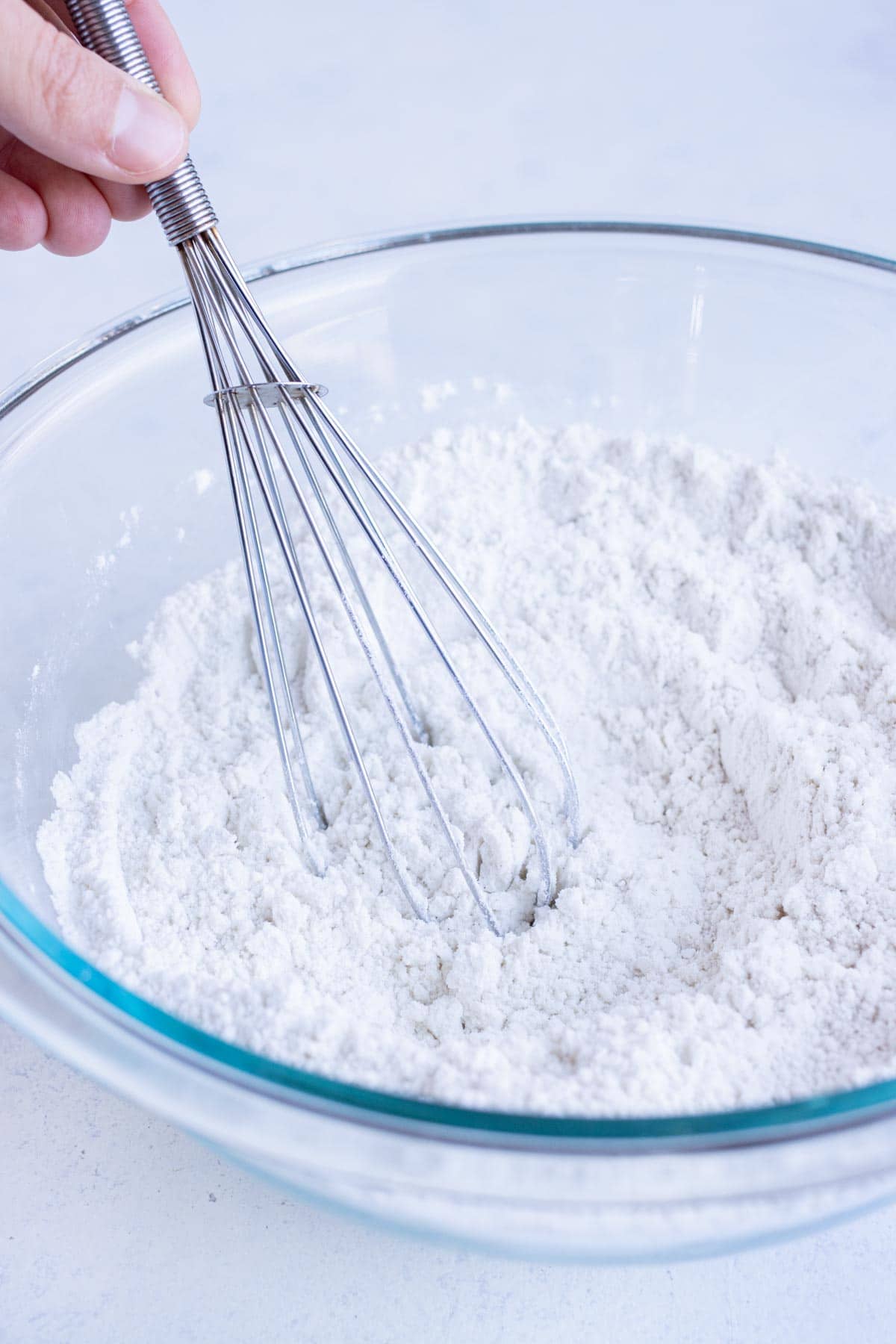 Dry ingredients are combined in a bowl.