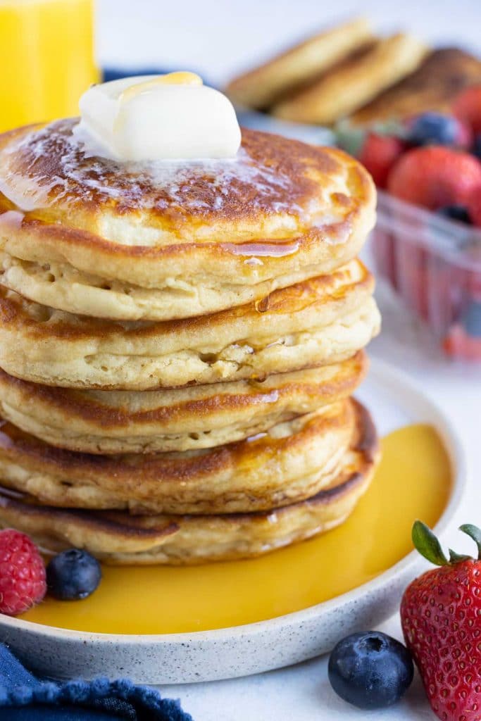 Pancakes are served on a white plate.