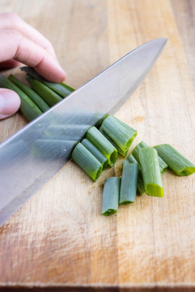 Green onions are chopped into big pieces.
