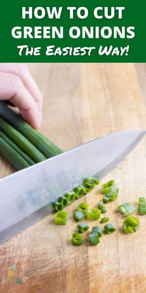 Green onions are finely cut with a knife.