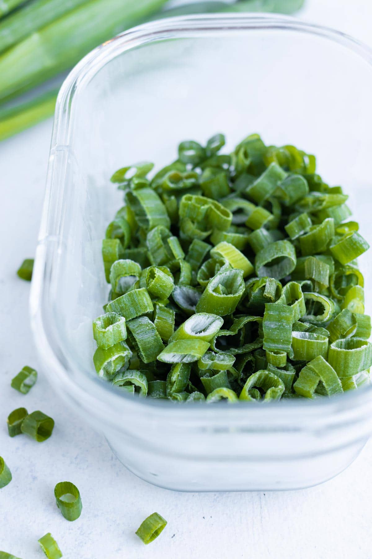 Sliced fresh green onions are frozen and stored.