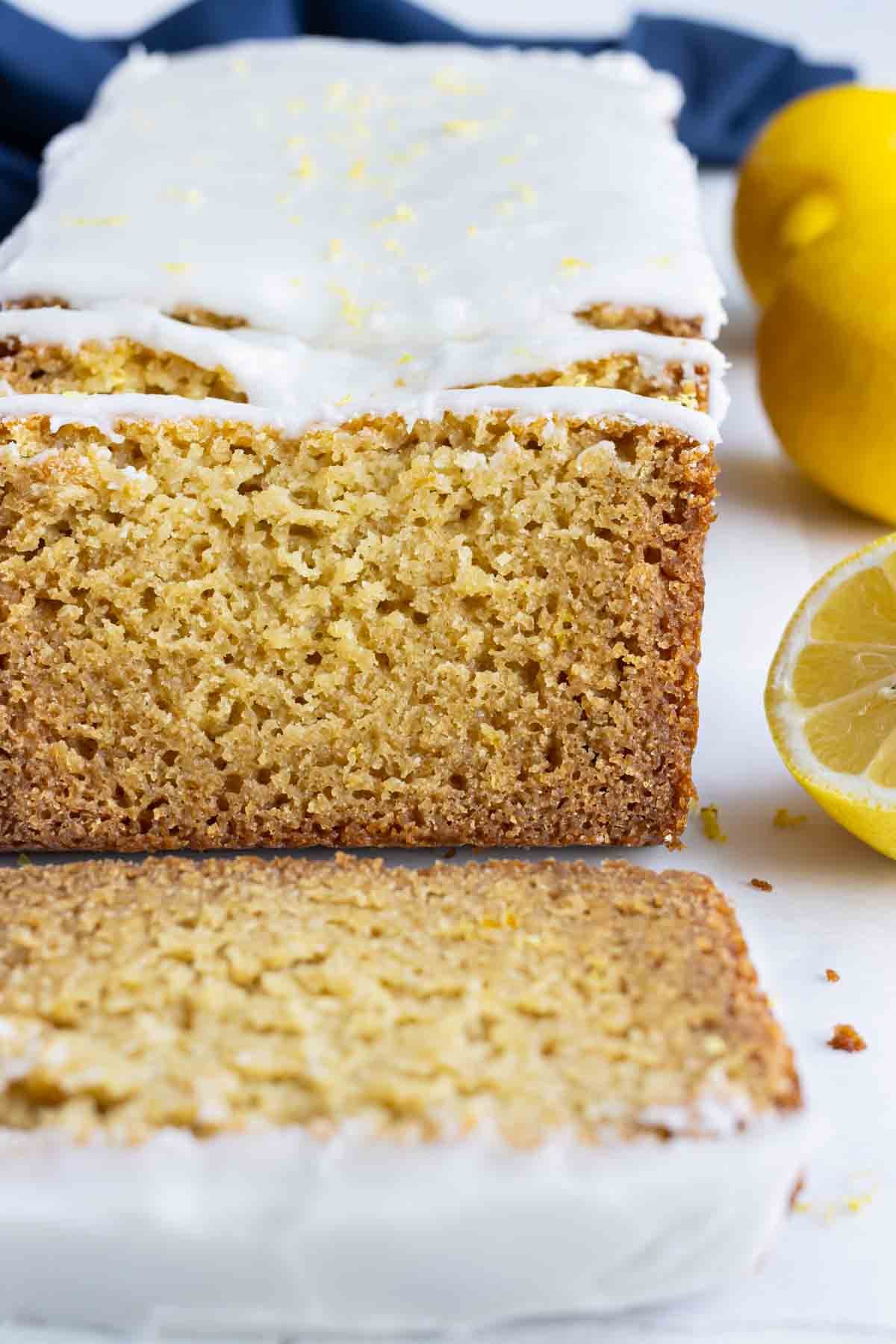 Copycat lemon loaf is sliced and served for breakfast.