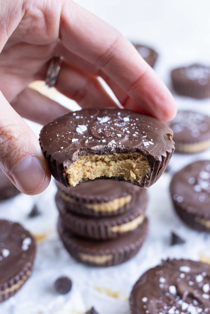 A bite is taken out of a homemade peanut butter cup.