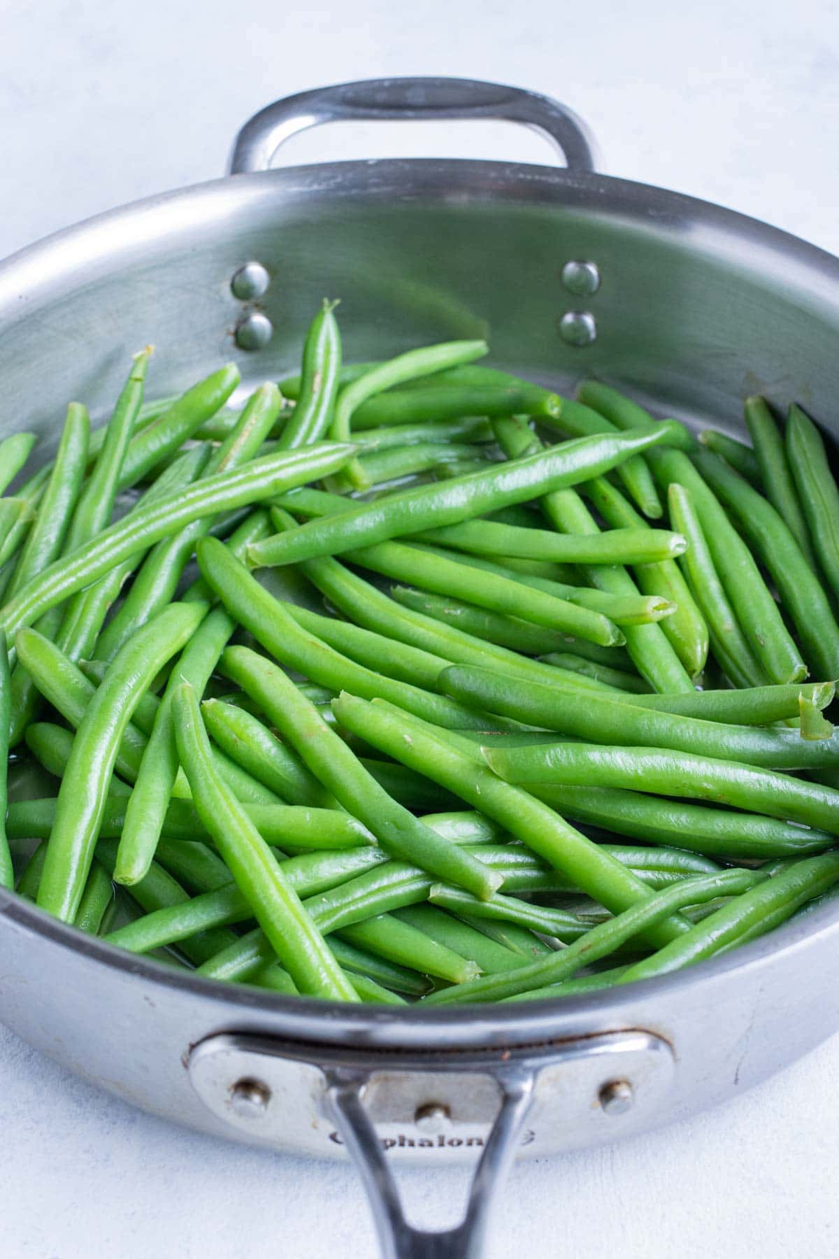 Beans are boiled in water until bright green and tender.